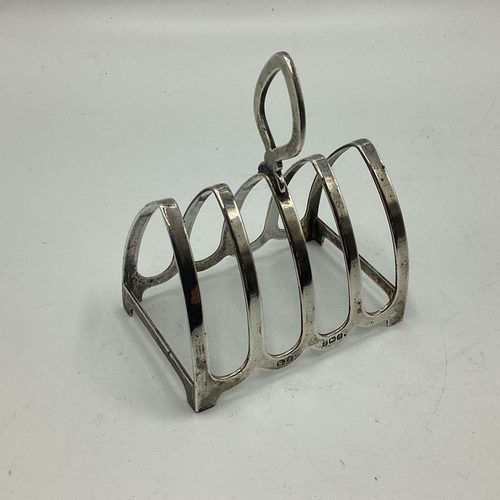 90 - Two Sterling silver items, four division miniature toast rack and a silver box with hinged lids, var... 