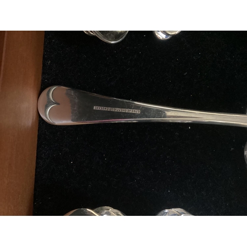 50 - A 12 piece Sheffield stainless steel cutlery set in original footed case.  Vendor paid £1,000.  In g... 