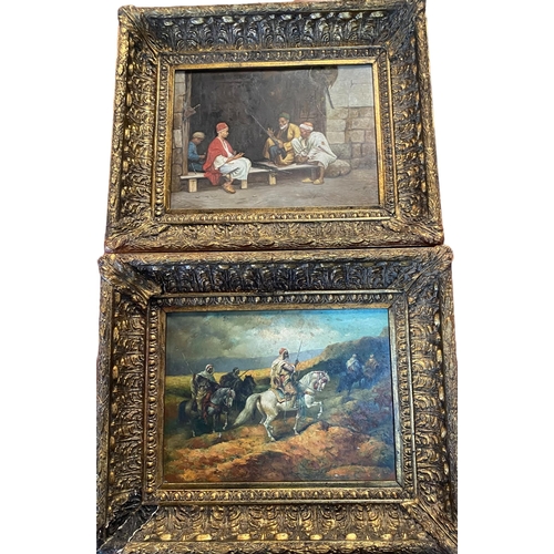 404 - Two middle eastern oil on boards in matching gilt recessed frames, the gunsmiths and the hunters, un... 