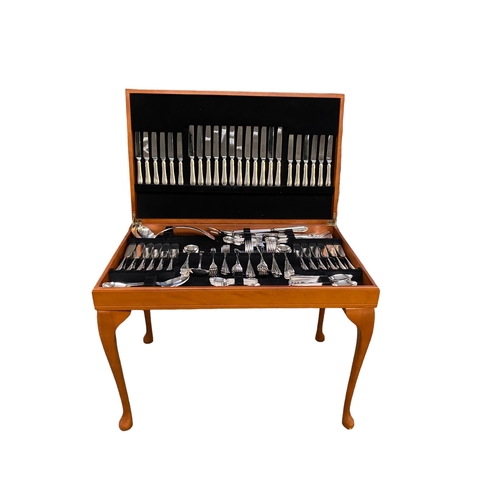 50 - A 12 piece Sheffield stainless steel cutlery set in original footed case.  Vendor paid £1,000.  In g... 