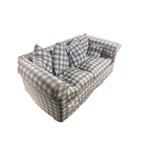 574 - A pull out sofa bed, with loose covers in a blue chequered pattern. With wear, from a clean house. 6... 