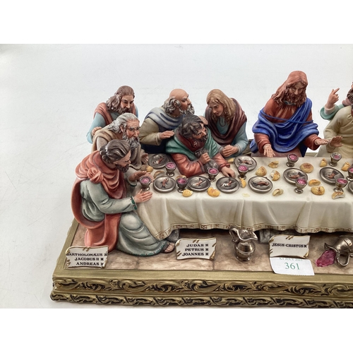 395 - A Capodimonte figural group. The Last Supper by Germano Cortese on a gilt plinth 2007/1566. signed t... 