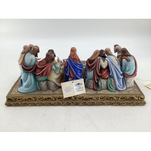 395 - A Capodimonte figural group. The Last Supper by Germano Cortese on a gilt plinth 2007/1566. signed t... 