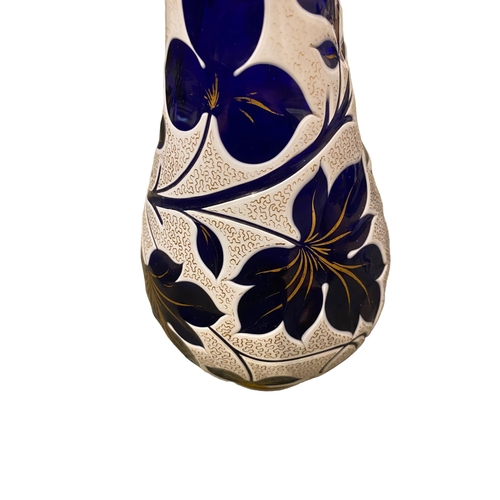 203 - Pair of C20th blue white and gilt waisted glass vases 39 cm H