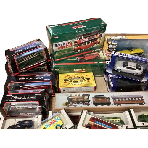 396 - A collection of boxed toys cars to include Corgi Vanguard and days Gone. Quantity.