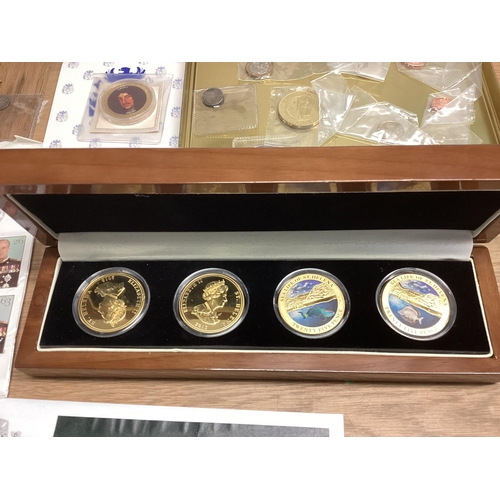 397 - A collection of 20th century commemorative and collectible coins and stamps and bank notes