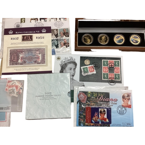 397 - A collection of 20th century commemorative and collectible coins and stamps and bank notes