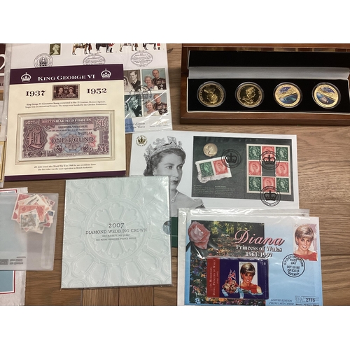 397 - A collection of 20th century commemorative and collectible coins and stamps and bank notes