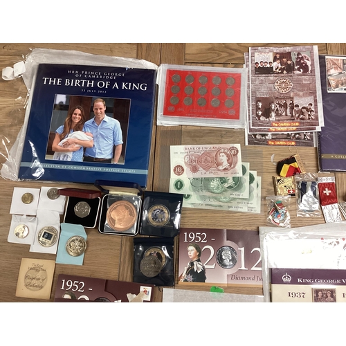 397 - A collection of 20th century commemorative and collectible coins and stamps and bank notes