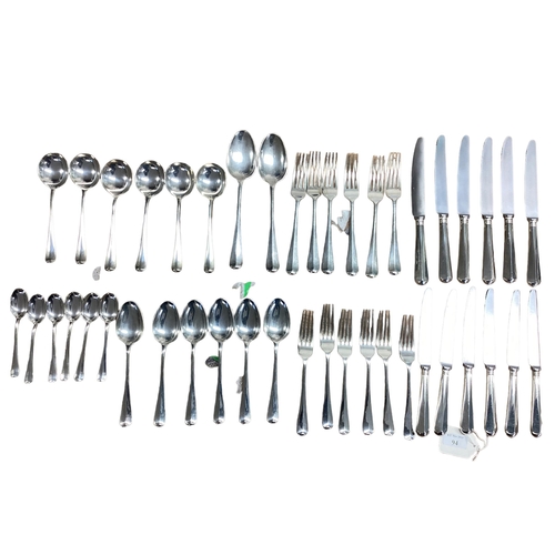 94 - A six person sterling silver flatware service together with sterling silver handled knives . William... 