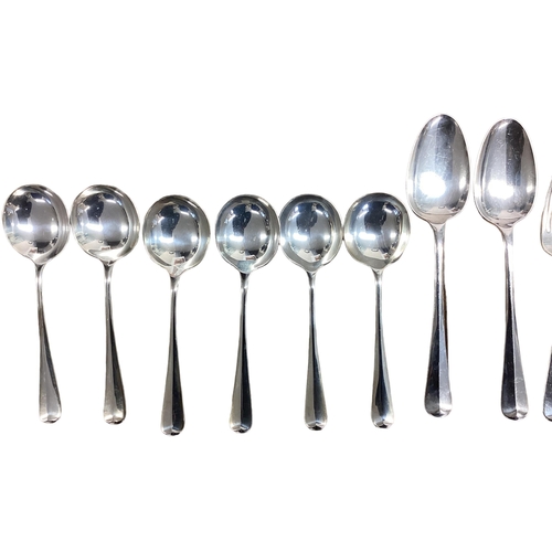 94 - A six person sterling silver flatware service together with sterling silver handled knives . William... 