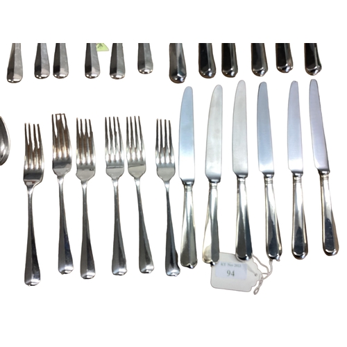 94 - A six person sterling silver flatware service together with sterling silver handled knives . William... 