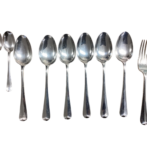 94 - A six person sterling silver flatware service together with sterling silver handled knives . William... 