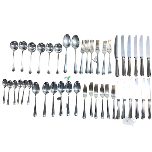 94 - A six person sterling silver flatware service together with sterling silver handled knives . William... 