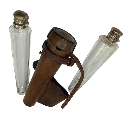 400 - Ladies tan leather hunting saddle flask with two conical glass flask