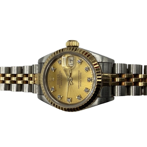 1 - ROLEX. A ladies stainless steel and yellow metal Oyster perpetual datejust, superlative chronometer.... 