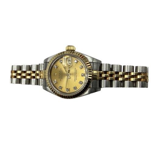 1 - ROLEX. A ladies stainless steel and yellow metal Oyster perpetual datejust, superlative chronometer.... 