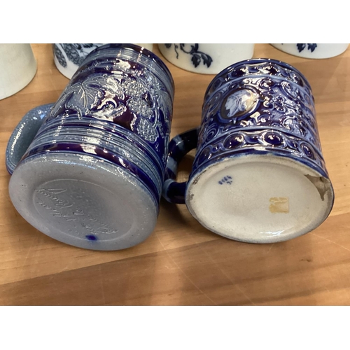 106 - A set of Staffordshire blue and white graduated jugs together and other items.