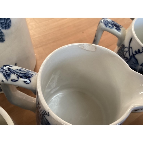 106 - A set of Staffordshire blue and white graduated jugs together and other items.