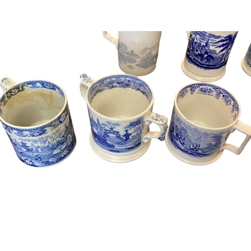 107 - A large collection of blue and white cider mugs, late 18th century to early 20th century, various ma... 