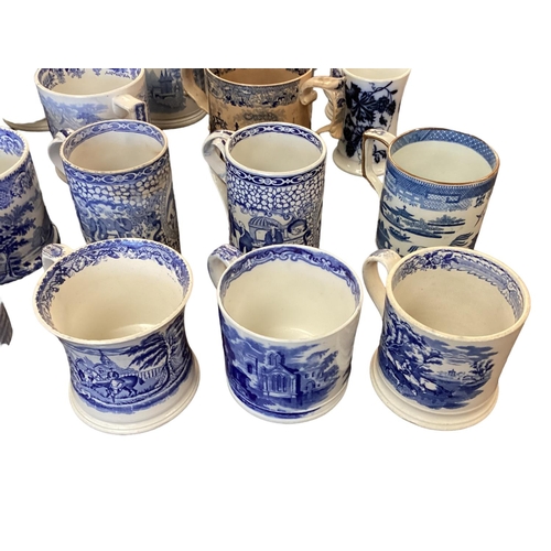 107 - A large collection of blue and white cider mugs, late 18th century to early 20th century, various ma... 