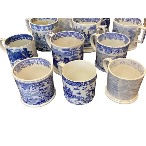 107 - A large collection of blue and white cider mugs, late 18th century to early 20th century, various ma... 