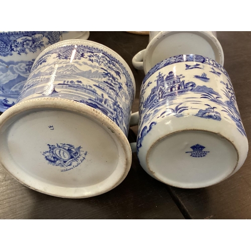 107 - A large collection of blue and white cider mugs, late 18th century to early 20th century, various ma... 