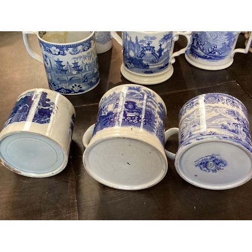 107 - A large collection of blue and white cider mugs, late 18th century to early 20th century, various ma... 