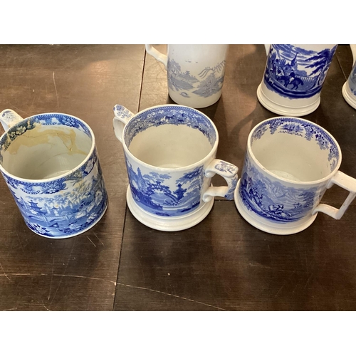 107 - A large collection of blue and white cider mugs, late 18th century to early 20th century, various ma... 