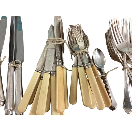 18 - Large collection of silver plated flatware and knives