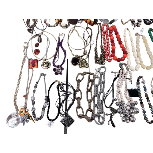 28 - A collection of costume and bead jewellery To include tigers eye with silver flower pendant, malachi... 