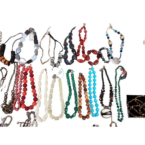 28 - A collection of costume and bead jewellery To include tigers eye with silver flower pendant, malachi... 