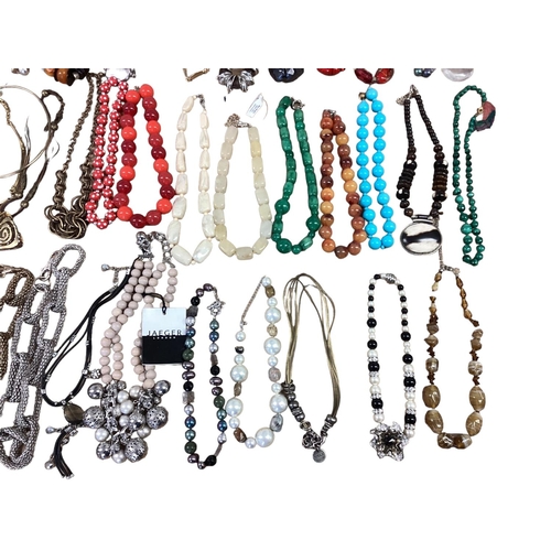 28 - A collection of costume and bead jewellery To include tigers eye with silver flower pendant, malachi... 