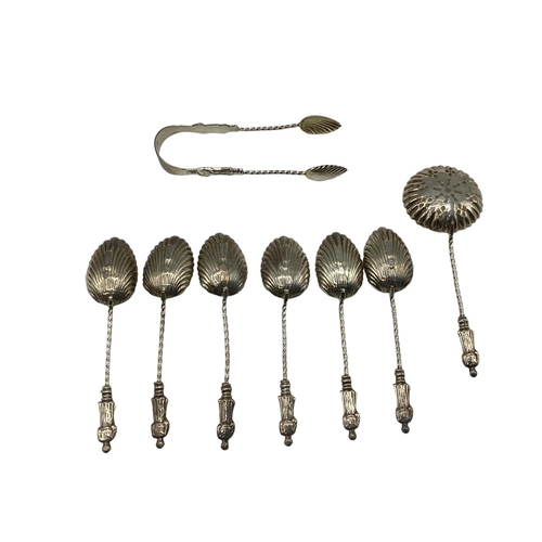 47 - A set of sterling silver coffee spoons with apostle finials, gilt shell bowls, matching sifter and t... 