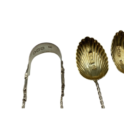 47 - A set of sterling silver coffee spoons with apostle finials, gilt shell bowls, matching sifter and t... 