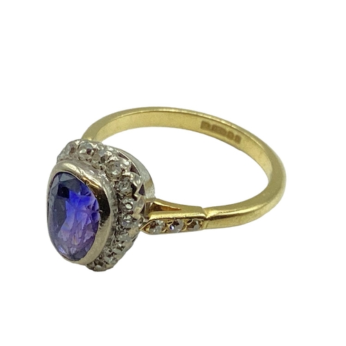 5 - An 18ct gold and unmarked white metal sapphire and diamond ring, central pair shaped free cut sapphi... 