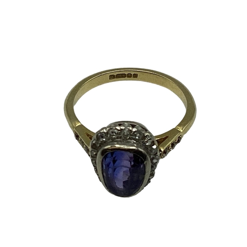 5 - An 18ct gold and unmarked white metal sapphire and diamond ring, central pair shaped free cut sapphi... 