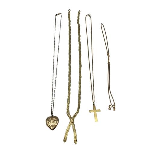 87 - A collection of 9ct items to include a flat link necklace crucifix, heart locket etc. 6.9g.