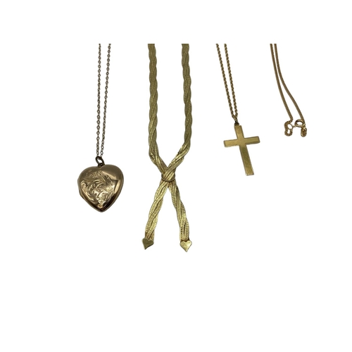 87 - A collection of 9ct items to include a flat link necklace crucifix, heart locket etc. 6.9g.