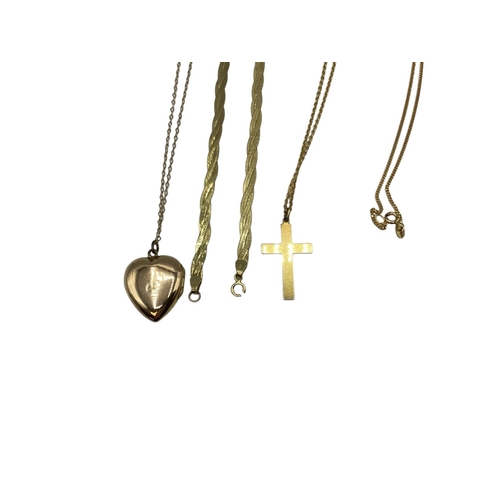 87 - A collection of 9ct items to include a flat link necklace crucifix, heart locket etc. 6.9g.