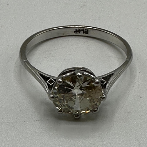 54 - A platinum and single stone diamond ring. Old brilliant cut diamond. 2.25ct in an 8 claw setting, D ... 