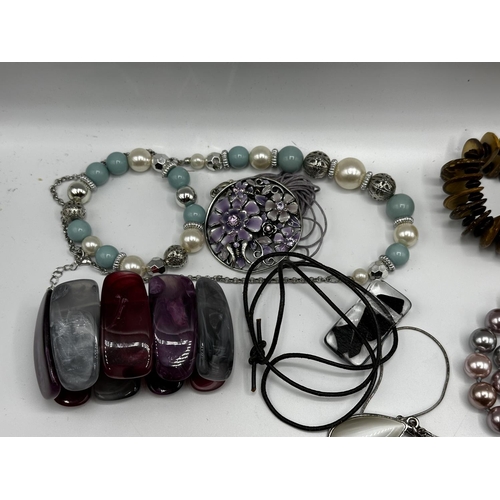 60 - A collection of costume and bead jewellery, white metal bangles etc.