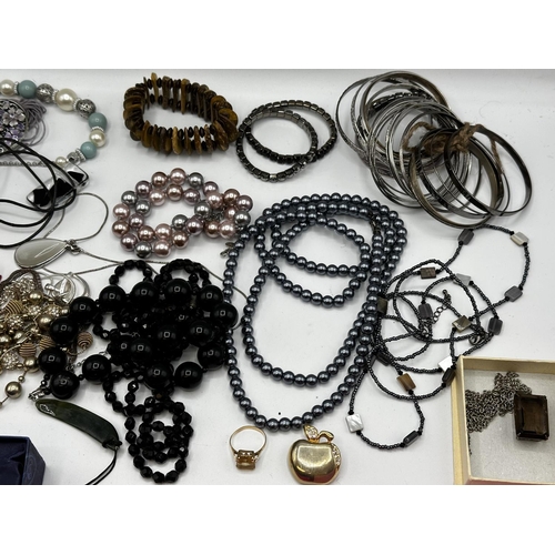 60 - A collection of costume and bead jewellery, white metal bangles etc.