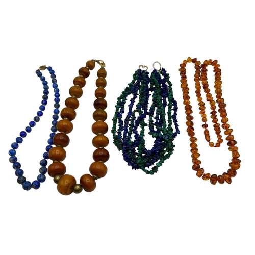 62 - A Honey Amber large beads necklace (later clasp)  and a collection of hardstone jewellery, to includ... 