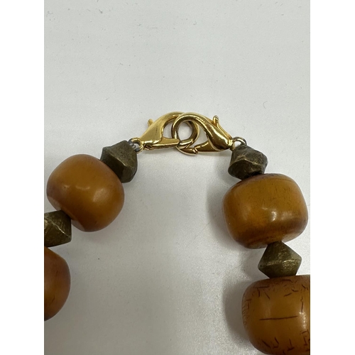 62 - A Honey Amber large beads necklace (later clasp)  and a collection of hardstone jewellery, to includ... 