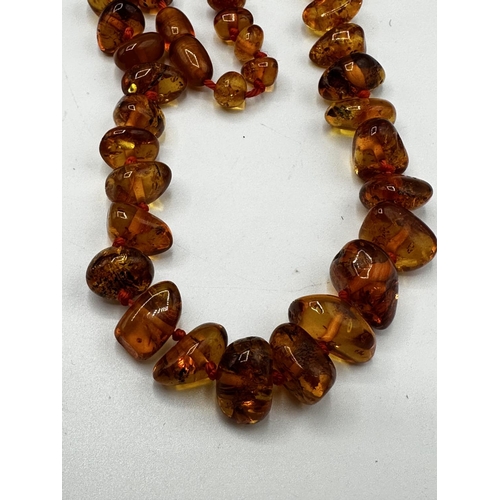 62 - A Honey Amber large beads necklace (later clasp)  and a collection of hardstone jewellery, to includ... 