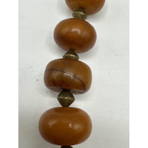 62 - A Honey Amber large beads necklace (later clasp)  and a collection of hardstone jewellery, to includ... 