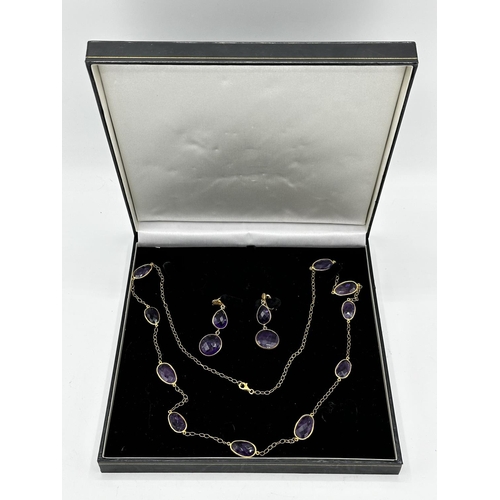 63 - A gilt silver and amethyst necklace and earing set. Set throughout with bezel set free cut checkerbo... 