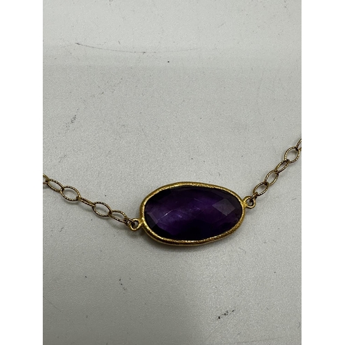 63 - A gilt silver and amethyst necklace and earing set. Set throughout with bezel set free cut checkerbo... 