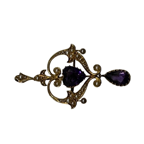 90 - A 15ct gold amethyst and split pearl art nouveau style pendant. 2.01g. In original box without chain... 